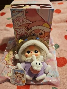 Plush Character Doll in Purple Outfit with Brown Hood